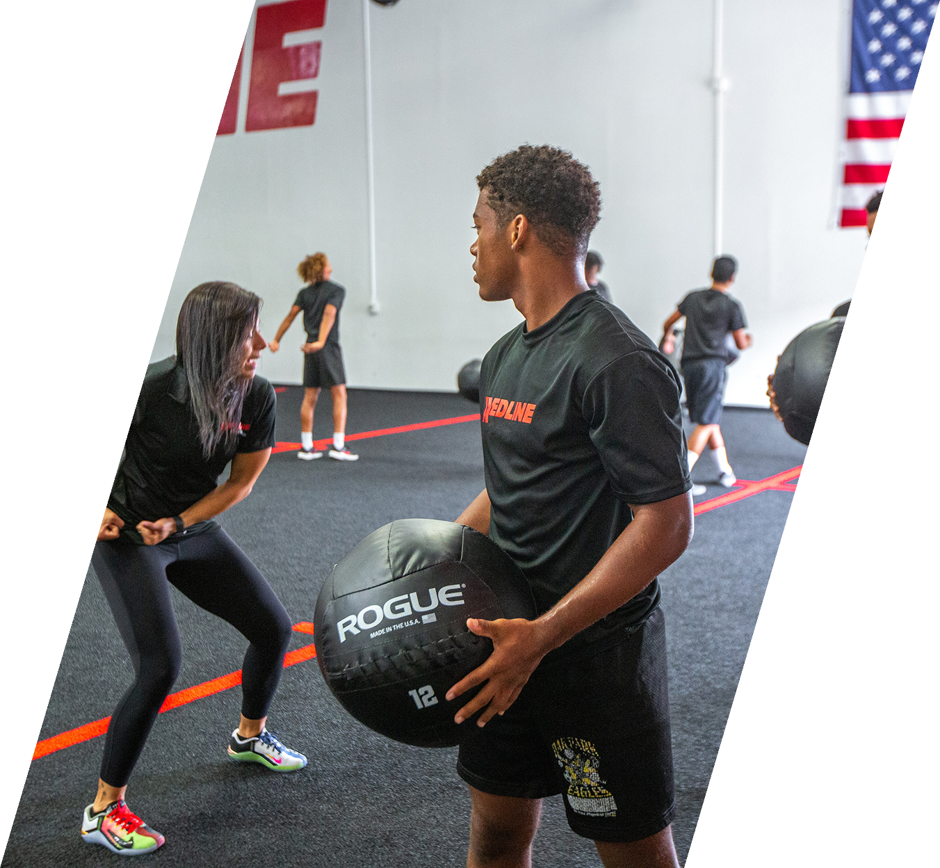Guy holding an exercise ball
